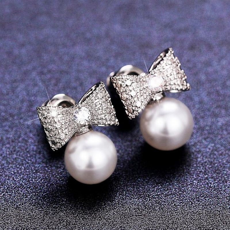 Stud Earrings Bow Shape with Simulated Pearl